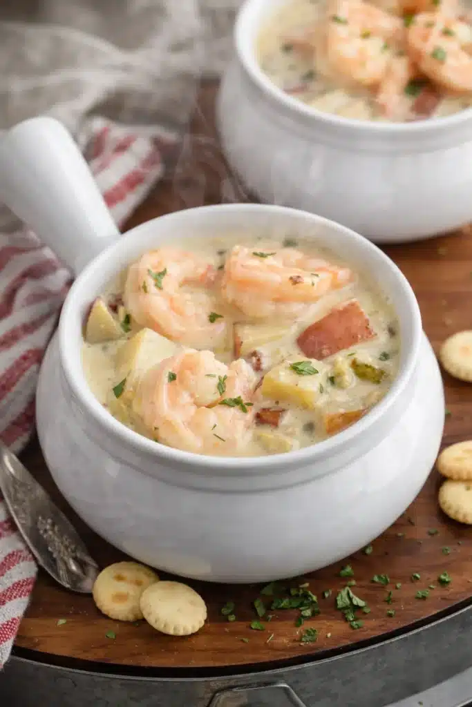 Seafood Chowder Easy Creamy Comfort Recipe 6 Creamy seafood chowder with shrimp and potatoes in a white bowl
