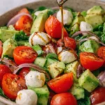 easy cucumber mozzarella salad with avocado tomatoes and balsamic dressing