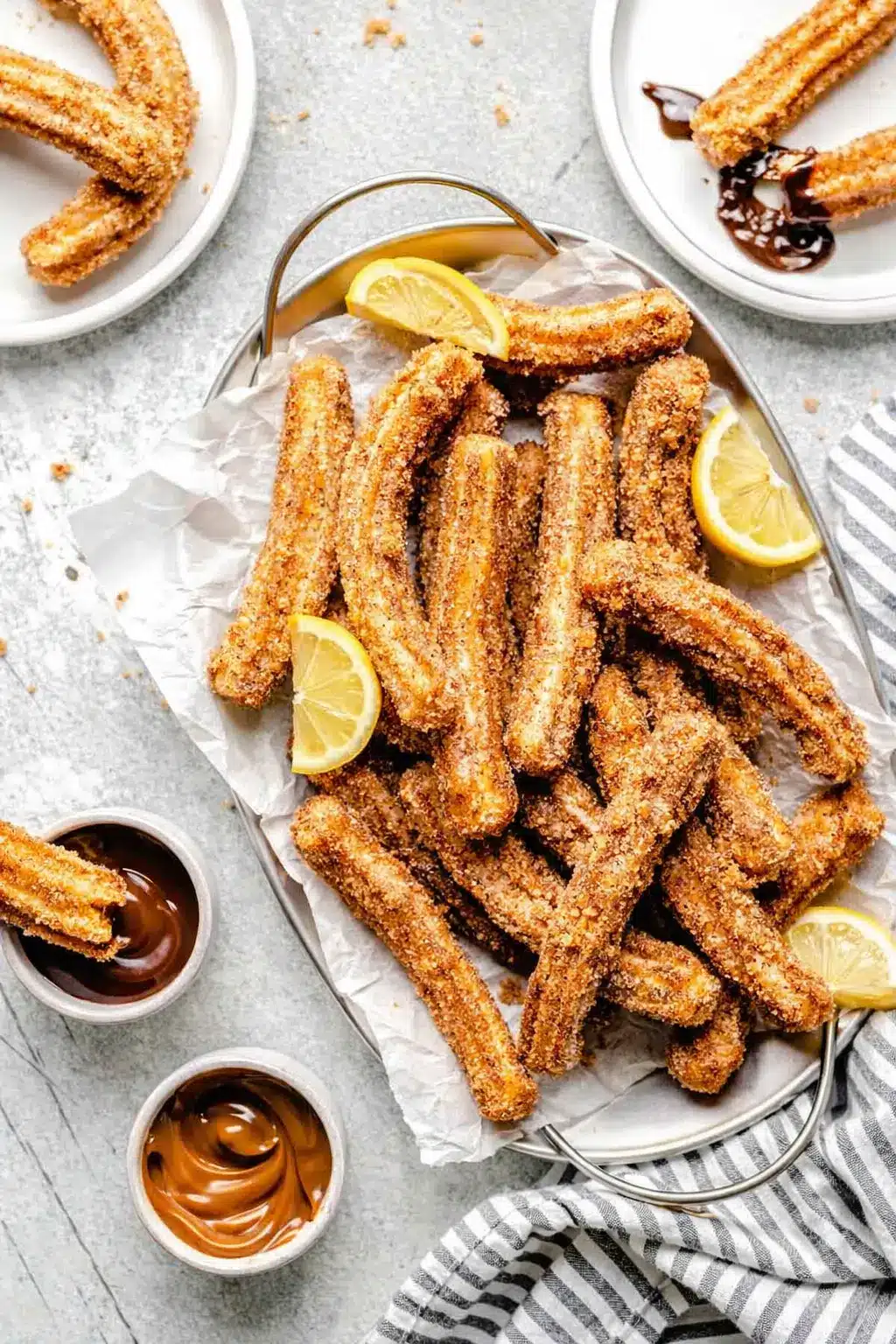 Homemade Mexican churros with cinnamon sugar and chocolate dipping sauce