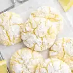 Lemon Crinkle Cookies Amazing Soft Citrus Treat 7 Soft lemon crinkle cookies with powdered sugar and cracked tops on a light surface