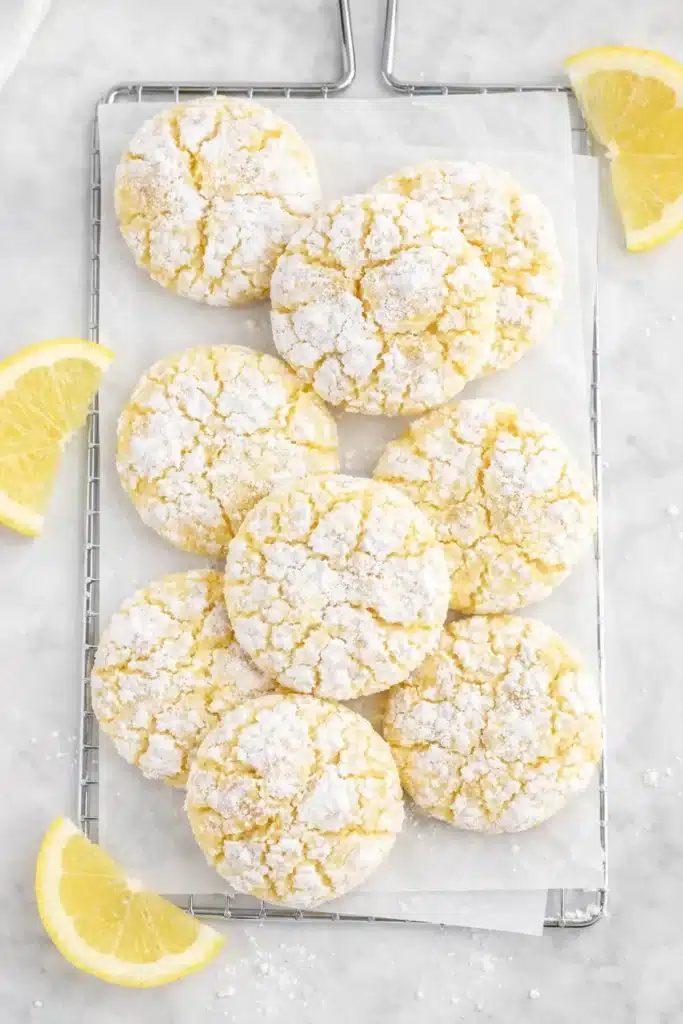 Lemon Crinkle Cookies Amazing Soft Citrus Treat 5 Lemon Crinkle Cookies with powdered sugar crackled tops on cooling rack