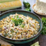 Mexican Street Corn Salad Easy Amazing Flavor 5 Mexican street corn salad with charred corn, queso fresco, jalapeño, and lime in a rustic bowl