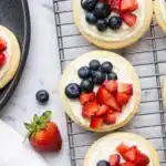 mini fruit pizzas with strawberries and blueberries on cookies ..