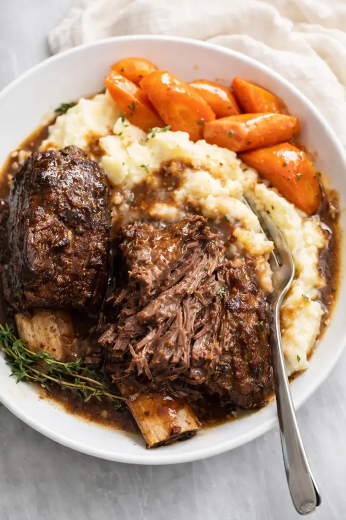 Slow cooker short ribs preparation step guide with hand holding recipe notes