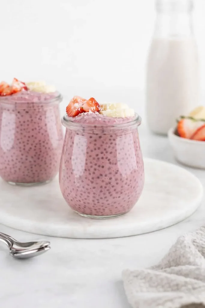 Strawberry Banana Chia Pudding Easy Amazing Guide 5 Strawberry Banana Chia Pudding in glass jars topped with fresh fruit