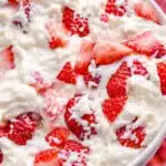 Strawberry Cheesecake Salad Easy Amazing Treat 5 Strawberry cheesecake salad with creamy texture and fresh strawberries in a bowl