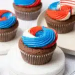 4th of July cupcakes with red white and blue frosting swirl on chocolate base