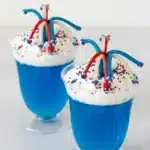 4th of July Dessert Fireworks Jello Cups with whipped cream and patriotic sprinkles