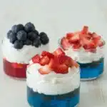 4th of July Fruit and Jello Cups with whipped cream, strawberries, and blueberries