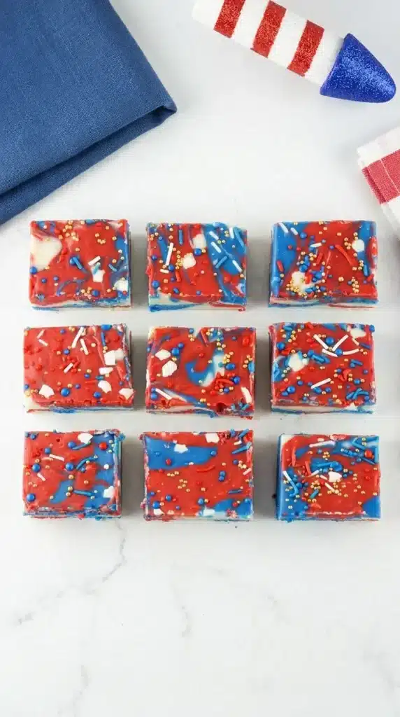 4th Of July Fudge Recipe with red white and blue swirls and festive sprinkles