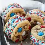 4th of July ice cream cookie sandwiches with patriotic sprinkles and vanilla ice cream filling