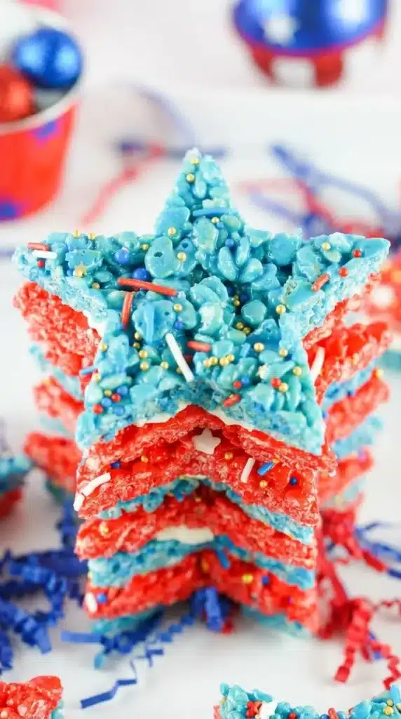 4th Of July Rice Krispie Treats with red and blue star layers and patriotic sprinkles