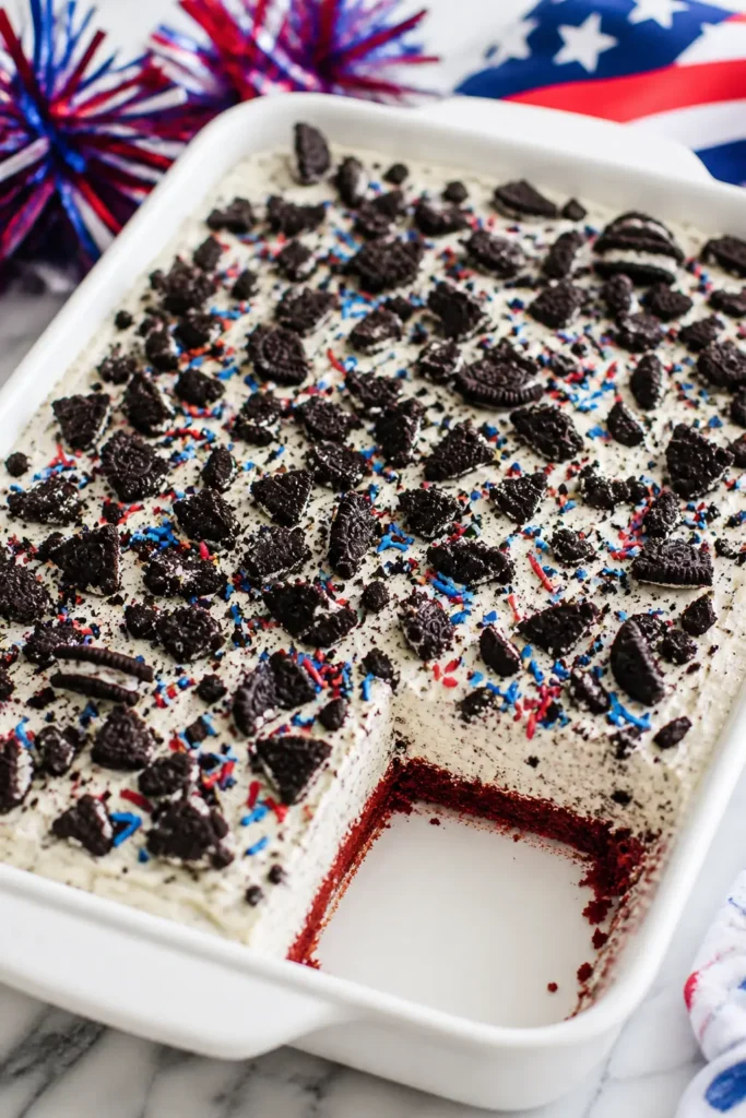 No Bake Fireworks Oreo Cheesecake Bars topped with crushed cookies and sprinkles