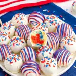 Red White and Blue Cake Balls with candy coating and patriotic sprinkles