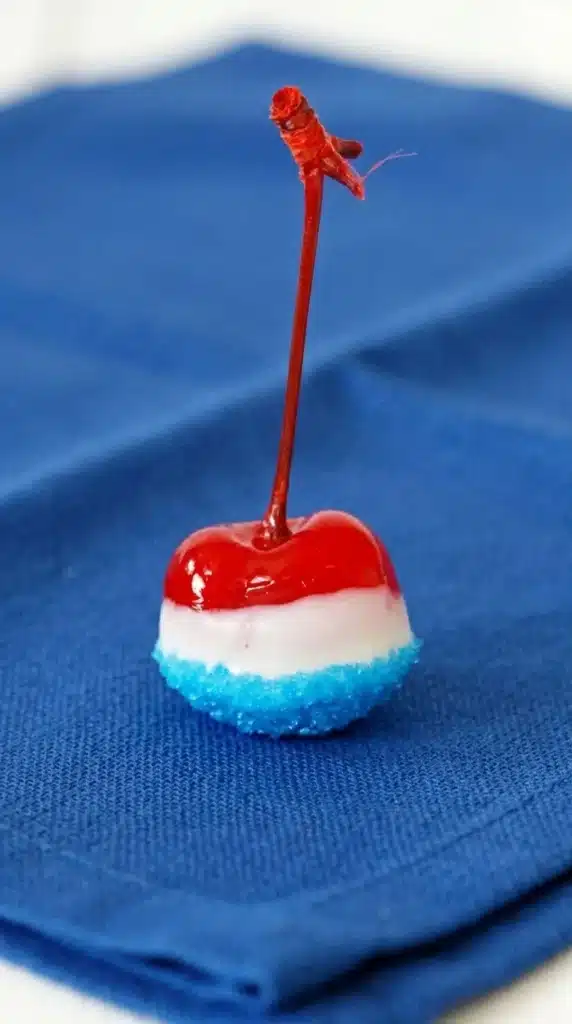 Single Boozy Cherry Bomb with white chocolate and blue sugar coating