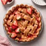 Brown Butter Strawberry Peach Pie with flaky lattice crust and fresh strawberries