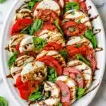 Caprese Salad with fresh mozzarella, tomatoes, basil, and balsamic glaze