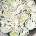 Cucumber Everything Bagel Salad Easy Amazing Lunch 15 Creamy cucumber everything bagel salad with red onion and savory seasoning in a ceramic bowl