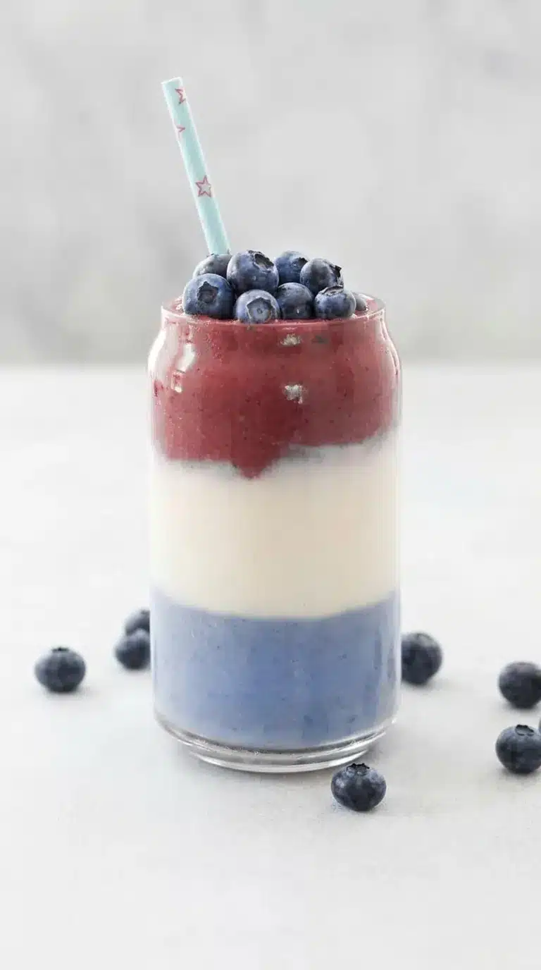 Dye free red white and blue smoothie with creamy layered patriotic colors