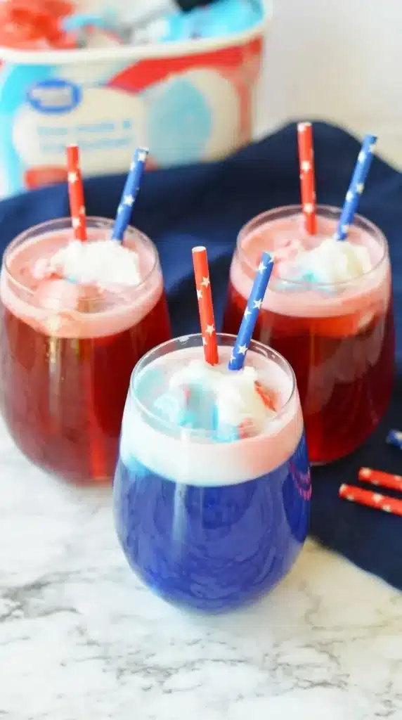 Easy 4th Of July Punch Recipe served in festive patriotic glasses with creamy sorbet