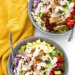Chicken Cobb Salad with grilled chicken, avocado, bacon, eggs, and ranch dressing