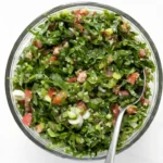 Fresh Lebanese Tabbouleh Salad with parsley, tomatoes, green onions, and bulgur wheat