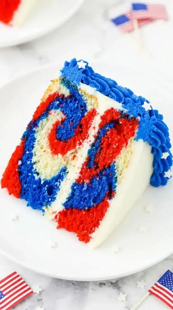 July 4th Marble Cake Recipe That Looks Amazing 8 Close up slice of July 4th Marble Cake with red white and blue swirls