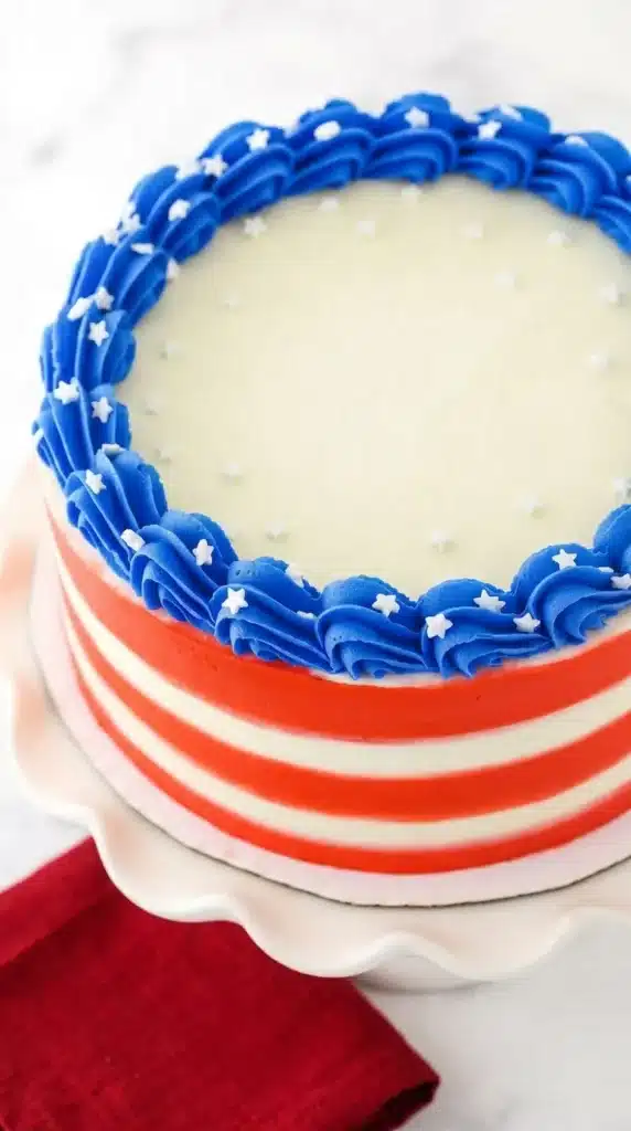 July 4th Marble Cake Recipe That Looks Amazing 7 Top view of July 4th Marble Cake with red white and blue buttercream frosting