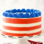 July 4th Marble Cake Recipe That Looks Amazing 9 July 4th Marble Cake with red white and blue buttercream frosting on a cake stand