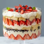 Mixed Berry Trifle Recipe That Feels Fresh and Amazing 7 Mixed berry trifle with strawberries, blueberries, whipped cream, and angel food cake layers