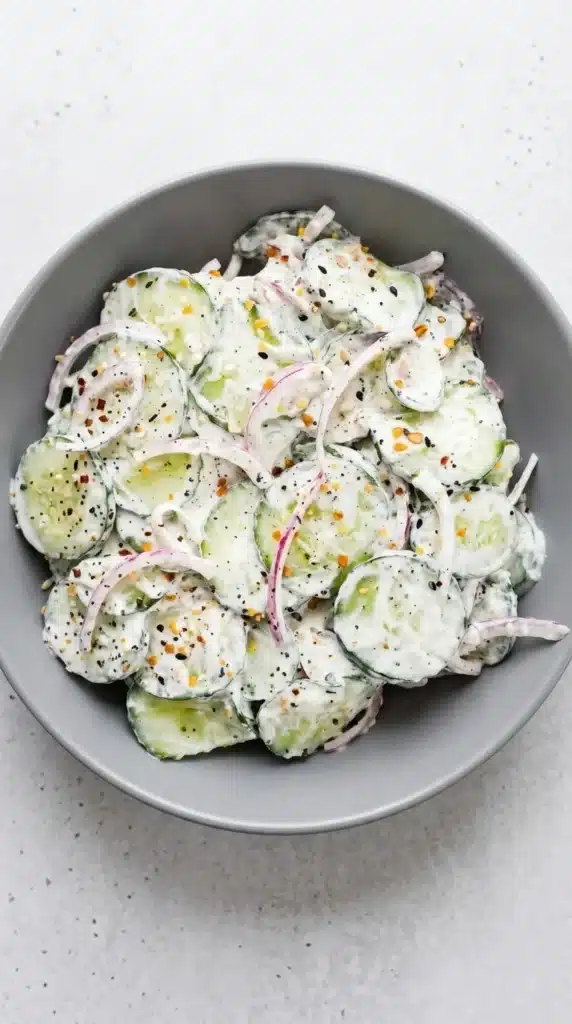 Cucumber Everything Bagel Salad Easy Amazing Lunch 9 Cucumber Everything Bagel Salad with creamy dressing and red onion in a rustic bowl