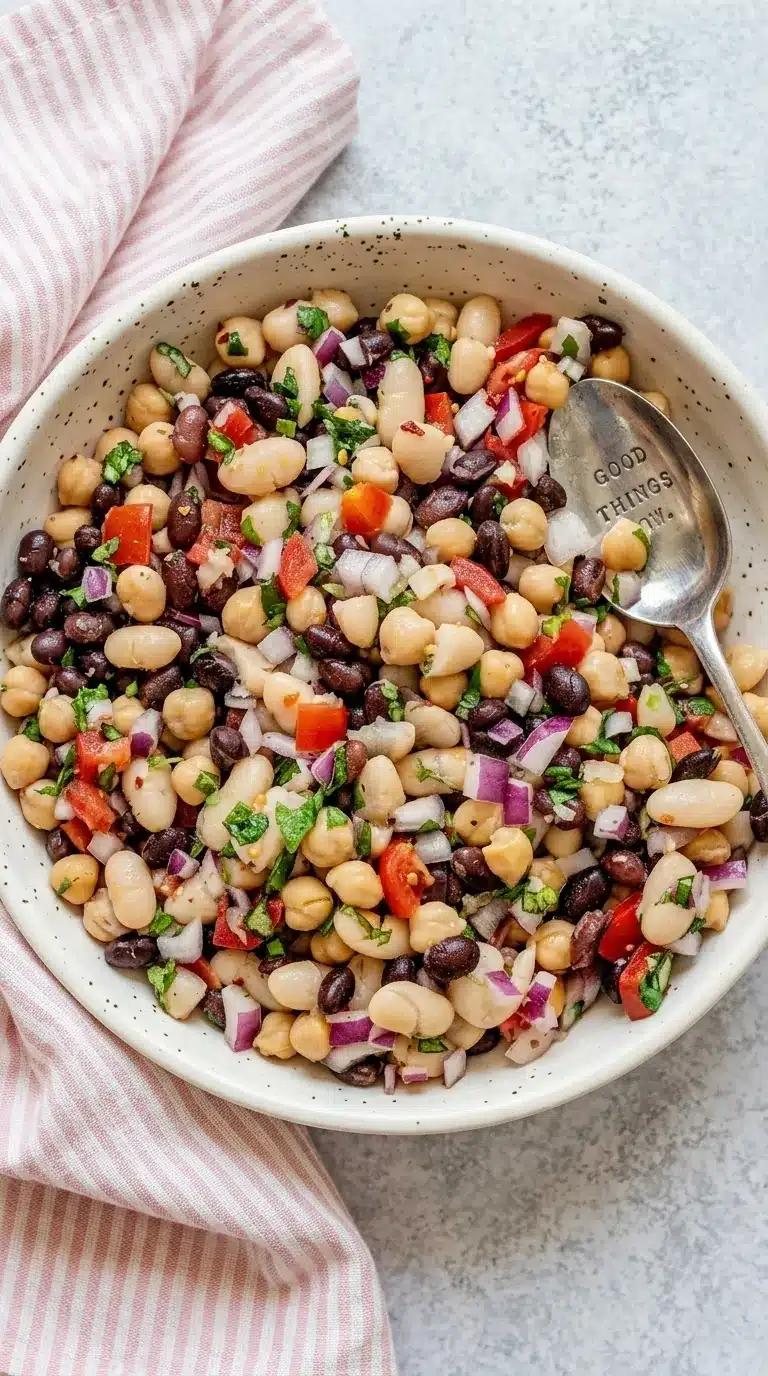 Lemon Basil Three Bean Salad with chickpeas, black beans, white beans, basil, tomatoes, and red onion