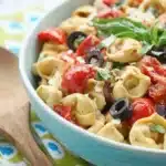 Parmesan Tortellini Salad | Amazing Easy Summer Favorite 7 Parmesan Tortellini Salad with roasted red peppers, basil, tomatoes, and olives
