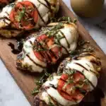 Simple Grilled Chicken Caprese with mozzarella, tomatoes, basil, and balsamic glaze