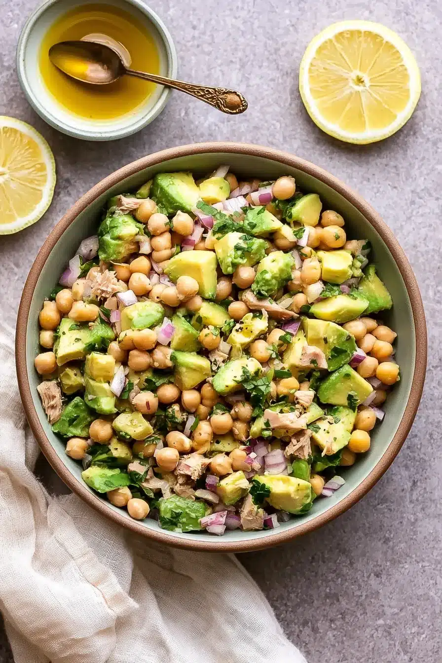 Avocado Chickpea Tuna Salad with chickpeas, tuna, avocado, red onion, parsley, and lemon vinaigrette
