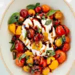 Baked Burrata Recipe | Amazing Easy Lunch Favorite 9 Baked burrata with roasted cherry tomatoes, fresh basil, and balsamic glaze in a serving bowl