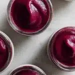 Blueberry Vanilla Applesauce Recipe | Amazing Easy Flavor 7 Blueberry vanilla applesauce in small bowls with smooth purple fruit puree