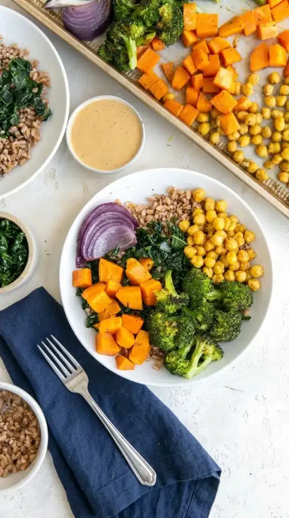 Broccoli Sweet Potato Bowl with roasted vegetables, chickpeas, kale, and grains