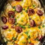 Crockpot Pierogi Casserole with kielbasa and cheddar cheese