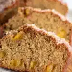 Easy Spiced Peach Bread Recipe | Amazing Cozy Flavor 9 Easy Spiced Peach Bread slices with fresh peaches and warm spices