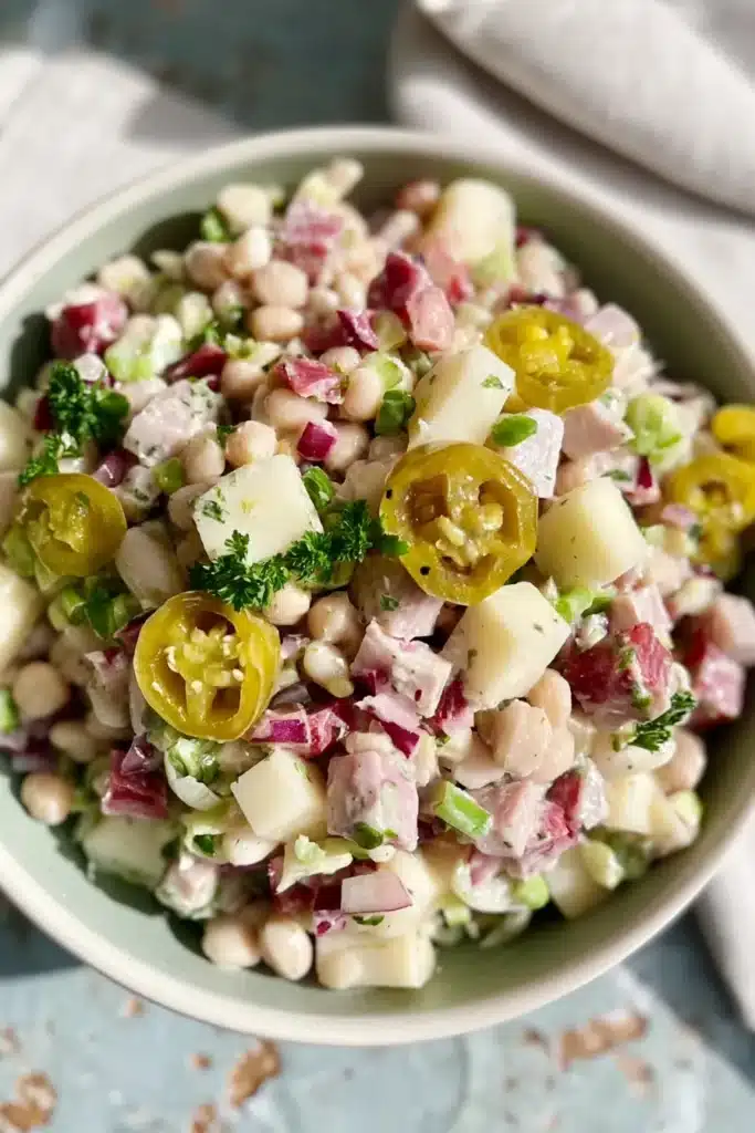 Italian Grinder Bean Salad with beans, salami, cheese, pepperoncini, and creamy dressing