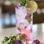 Lavender Mojito Mocktail with mint, lime, crushed ice, and sparkling floral flavors
