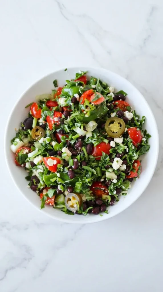 Mediterranean Black Bean Salad With Herbs & Feta with fresh vegetables