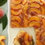 Peach Upside-Down Cake Recipe | Amazing Easy Homemade Treat 7 Peach upside-down cake with caramelized peaches on a platter
