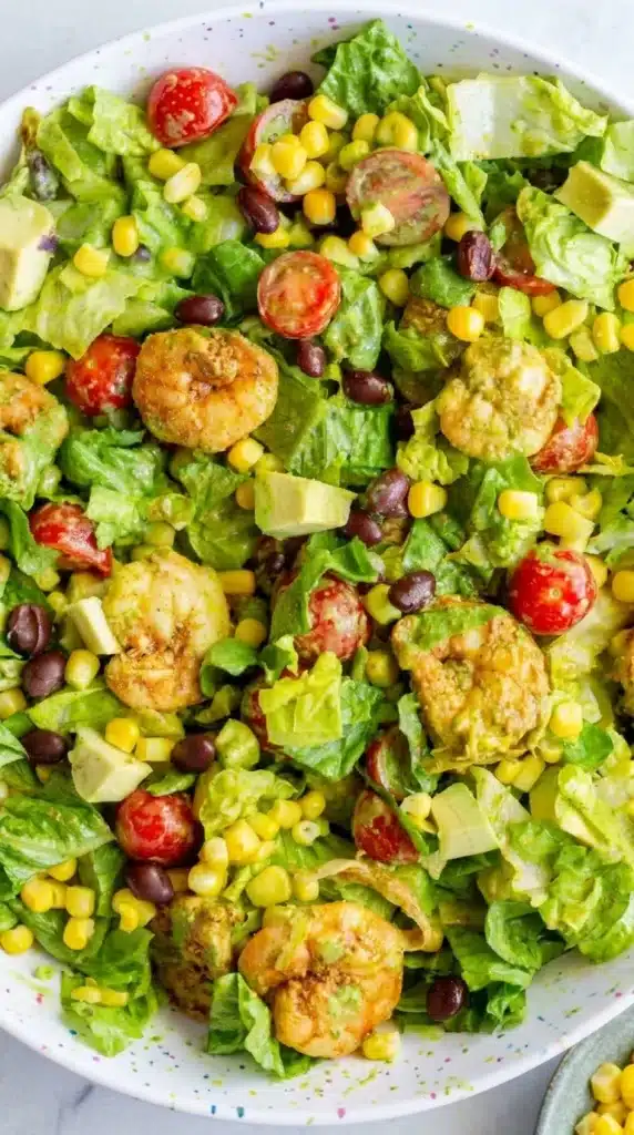 Close-up of Southwestern Shrimp Salad with shrimp, avocado, corn, black beans, and cilantro dressing