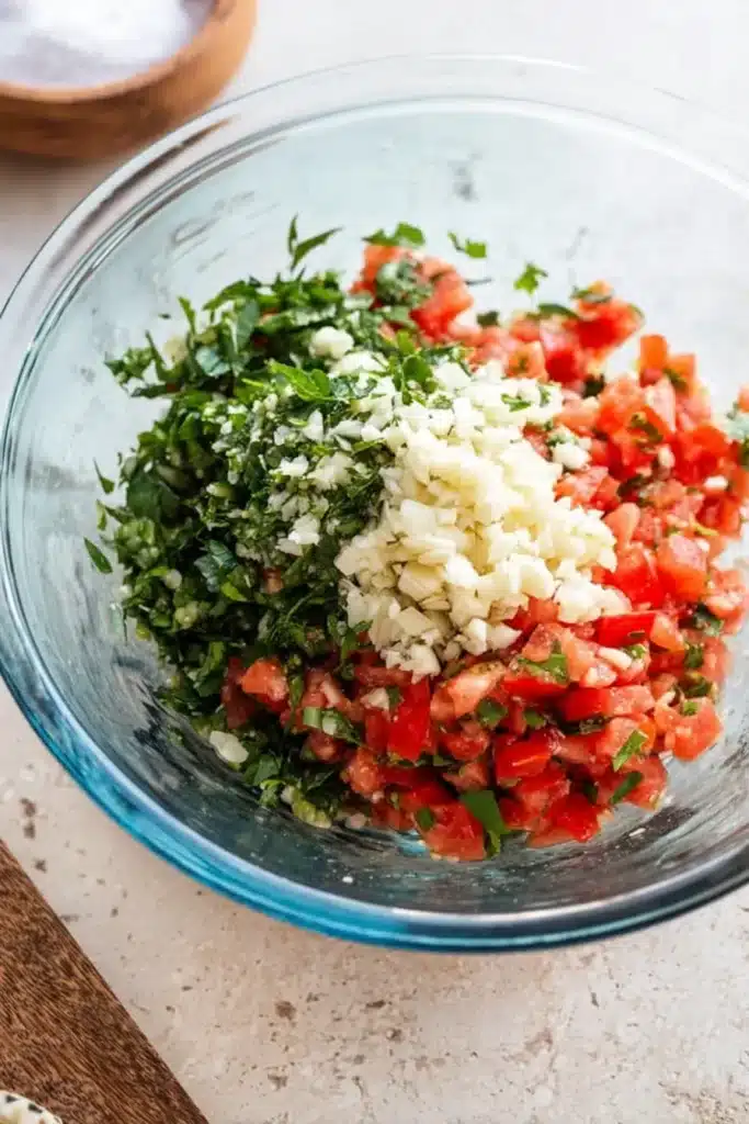 Trader Joe’s Bruschetta Sauce ingredients in a mixing bowl