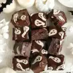 Triple Chocolate Shortbread Brownies with ganache and white chocolate ghosts
