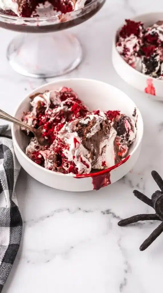 Vampire Halloween Trifle Amazing Spooky Party Treat 5 Vampire Halloween Trifle served with red velvet cake, chocolate pudding, and whipped cream