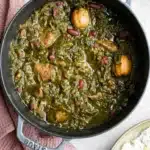 Ghormeh Sabzi with beef, kidney beans, dried limes, and basmati rice