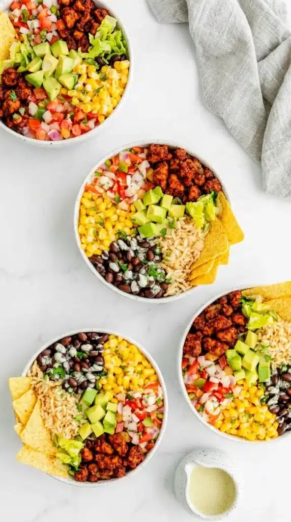 Vegan Tempeh Burrito Bowls | Amazing Easy Lunch Recipe 8 Close up of Vegan Tempeh Burrito Bowls with tempeh, rice, beans, avocado, and corn